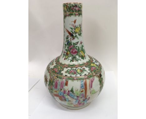 A canton bottle vase decorated with figures flowers and foliage, paint loss , no damage or restoration 40 cm