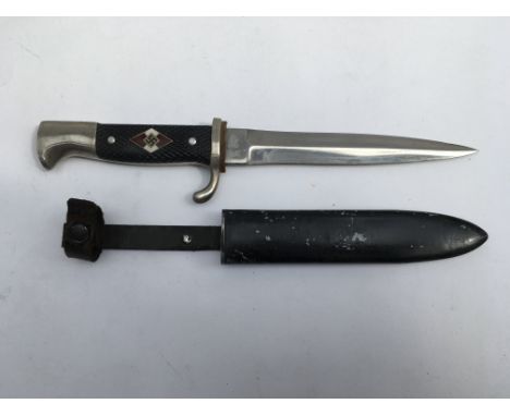 A WW2 Hitler youth knife bearing Solingen makers mark with scabbard. Blade length approx 15cm, total 26cm.