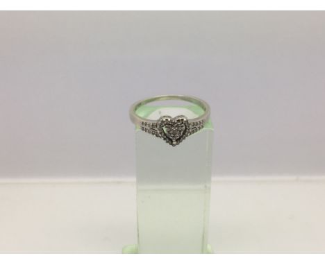 A 9ct white gold ring with a central heart design set with diamonds, approx 2.29g and approx size Q-R.