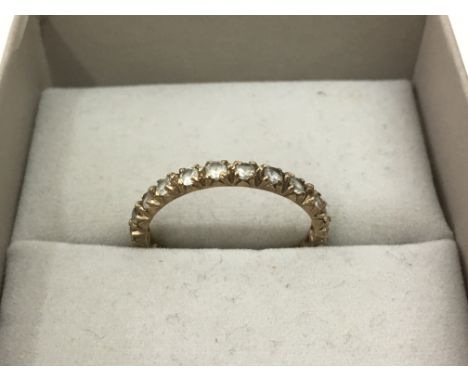 A 9ct gold eternity ring. Approx O - NO RESERVE