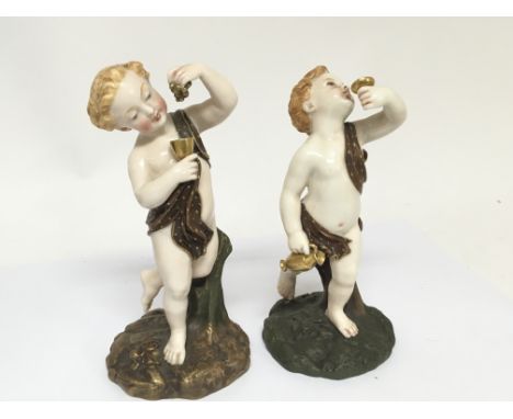 A pair of 19th Century Worcester porcelain figures young Bacchus on naturalistic bases, height 18cm (extremely minor chips to