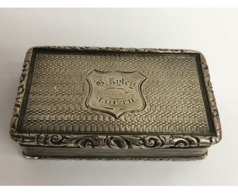 A Victorian, Birmingham silver snuff box  engine turned lid and gilt interior, monogrammed lid.Approx 4x7cm