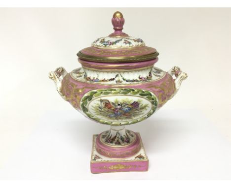 A Quality French 19th Century vase urn and cover with Sevres  factory marks to the base. Decorated with a pink and white glaz