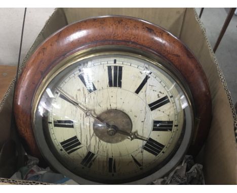 A Victorian postman’s wall alarm clock with weights and pendulum. Clock face in need of restoration.