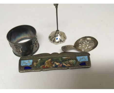 A collection of silver items comprising an Italian Silver 19th Century comb with enamel decoration a Chinese napkin ring Geor