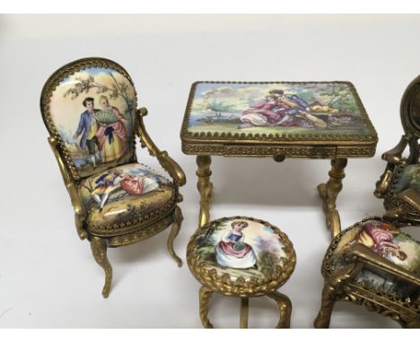 A Quality French enamel and gilt metal detailed miniature suite of furniture each enamel panel depicting figures after the Fr