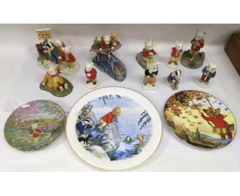 A collection of Rupert Bear figures by Beswick and Doulton