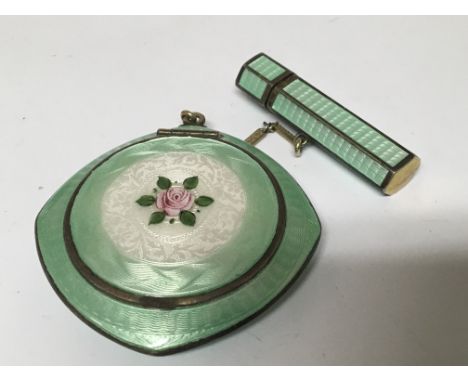 A Quality green enamel enamel and Parcel gilt  compact and cigarette holder.