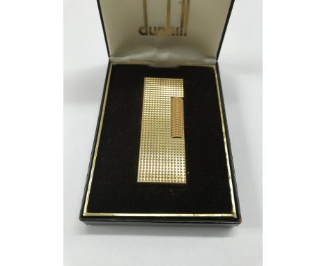 A cased Dunhill gold plated  lighter