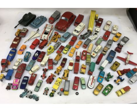 A collection of playworn die-cast vehicles including Corgi and Dinky E-Ttype Jaguar