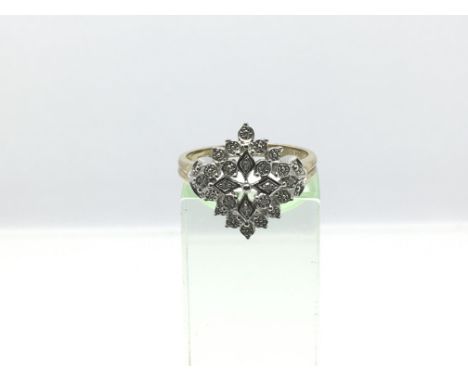 A 9ct gold diamond cluster ring, approx 3.4g and approx size O-P.