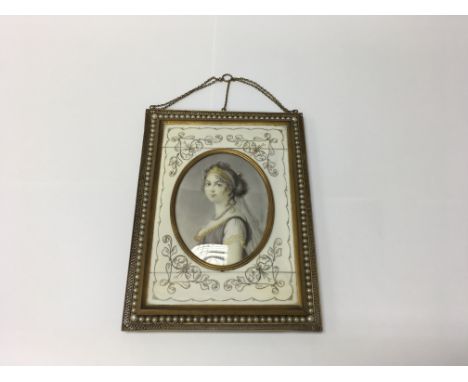 A quality 19th century oval framed portrait miniature of a lady in fine clothing, mounted in a quality 20th century frame. Si