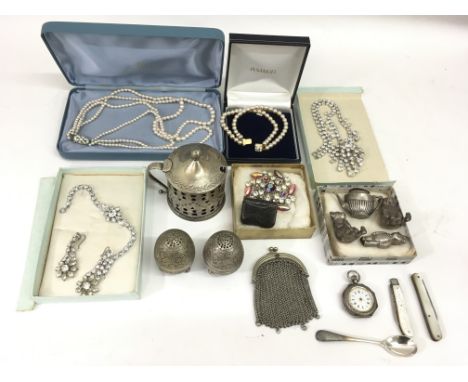 A collection of silver odds including miniature  bear pepperettes and teapot, pierced mustard pot, fob watch and jewellery