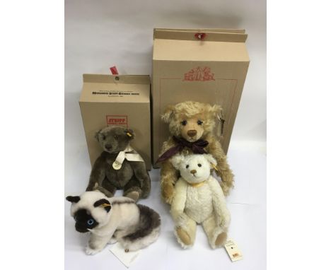 Three Steiff collector's bears including a boxed 'Year 2000' bear, plus a conforming cat