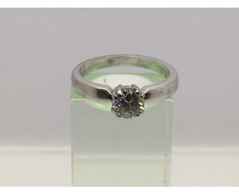 An 18ct white gold solitaire ring, approx .75ct, approx 5.14g and approx size O-P.