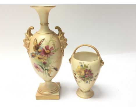 A Royal Worcester Porcelain vase hand painted with flowers and butterflies and a similar design vase with a loop handle (2) n