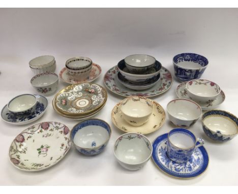 A collection of 18th and 19th century British porcelain including a Worcester tea bowl and dish, hand painted cups and some O