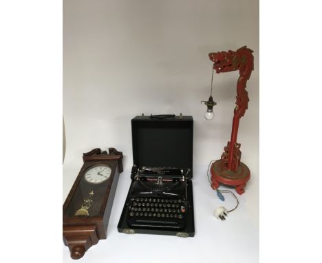 A group of items to include an American Remington portable typewriter, a wall clock and a Chinese style hanging lamp in the f