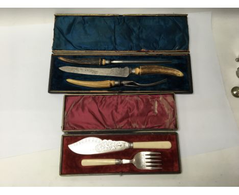 A Victorian three piece carving set with bone handles and HM silver rims in a fitted case, and a silver plated pair of servin