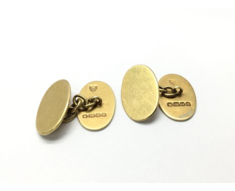 A pair of 18ct gold cufflinks, total weight approx 9.5 grams.