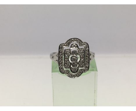 A 9ct white gold Art Deco style diamond cluster ring, approx 3.2g and approx size O.