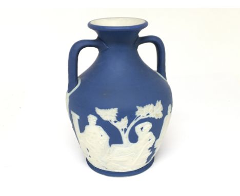 A Wedgwood Early 20th Century model of the Portland vase impressed marks to the base. No damage or restoration. Height 17.5cm