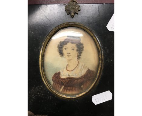 A Victorian portrait miniature of a lady in lacquer frame