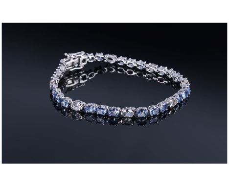 Tanzanite and White Topaz Tennis Bracelet, oval cut tanzanites, the gemstone found only in the foothills of Mount Kilimanjaro