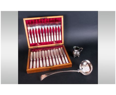 Set Of 24 Mother Of Pearl Handled Fruit Knives And Forks In Red Lined Mahogany Case. Together With A Soup Ladle And A Small C