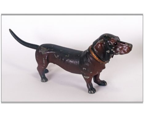 German Cold Painted Metal Petrol Cigarette Lighter In The Form Of A Dachshund Dog, touch the tail the head opens to reveal th