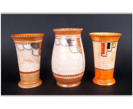 Crown Ducal Vases, 3 in total. 'Stitch Patch' Pattern Number 3274. Vertical stripes enamelled in scarlet, black & orange with