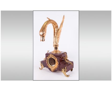 French Pink Marble Antique Clock Case with gilt attachments and feet (minus clock works) Surmounted  with a mythical bird wit