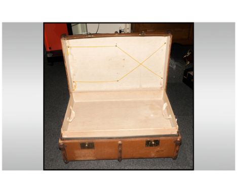 Large Canvas Covered Travelling Trunk wood strips attached with metal hinges, brass lock plates. Circa 1920's with fitted int
