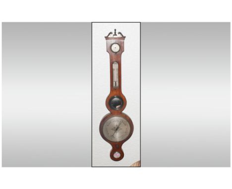 A Georgian Mahogany Banjo Shaped Barometer with a silvered dial and a thermometer in a silvered case. With a scroll top and a