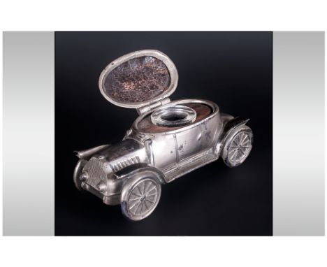 German Silver Plated Inkwell, in the form of a car, with a hinged lid exposing a glass inkwell. Circa 1920's