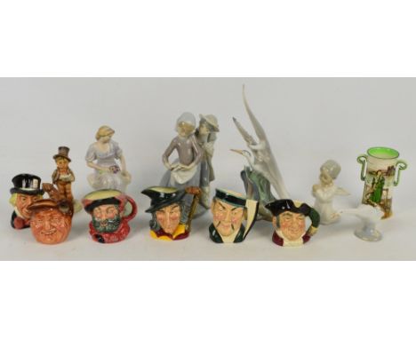 A group of six Royal Doulton character jugs to include "Pied Piper", "Mad Hatter", and "Mine Host", a Royal Doulton Dickenswa