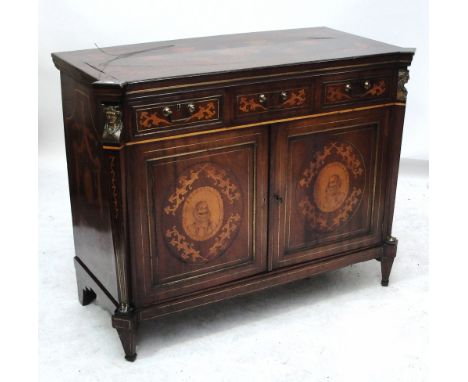 An early 19th century Dutch walnut and marquetry inlaid side cabinet, the shaped top unusually decorated with a carafe beside