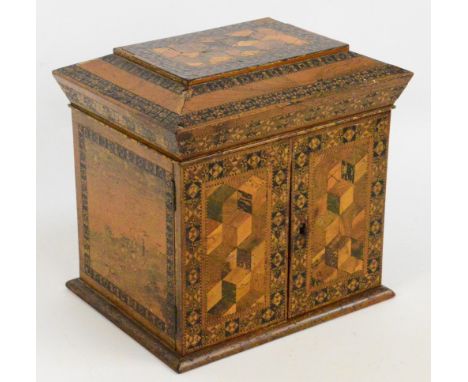 A c.1880 Tunbridge Ware jewellery cabinet with hinged lid set with geometric patterns, two hinged doors below enclosing three