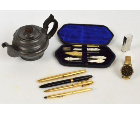 A vintage Sheaffer pen (af), three further pens, a Maruman lighter, a pewter teapot, a signed rolled print, a cased travellin
