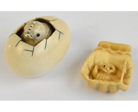 A Japanese Meiji period carved ivory netsuke, intricately detailed with a chick emerging from a "broken" egg, signed to base,