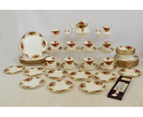 A Royal Albert "Old Country Roses" pattern tea and dinner ware comprising sox dinner plates, nine side plates, teapot, eight 