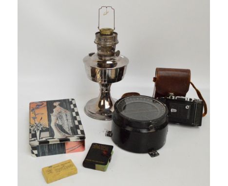 A small quantity of collectors' items including a chrome oil lamp, a leather cased Zeiss Ikon bellows camera, a large compass