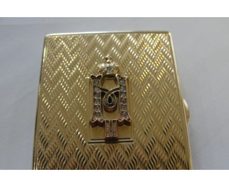 CARTIER; an early 20th century 14ct yellow gold rectangular snuff box, the engine turned hinged lid set with diamonds to the 