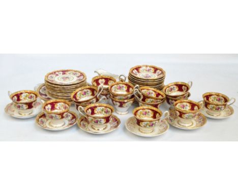 A Royal Albert "Lady Hamilton" pattern decorated part tea set comprising cups, saucers, larger examples, a sugar bowl, a crea