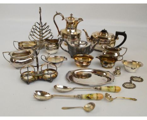 A group of electroplated items to include a teapot with matching sugar bowl and cream jug, a further teapot of small proporti