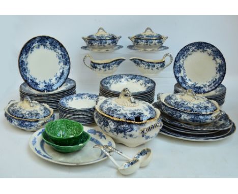 A large quantity of blue and white dinner ware in "Chatsworth" pattern comprising twelve dinner plates, eleven dessert plates