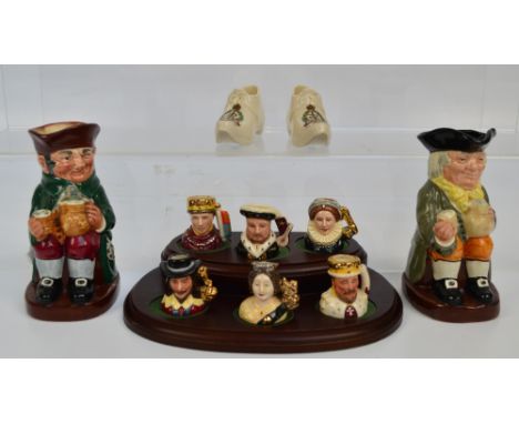 Two full character jugs; "Old Charlie" and "Happy John", a set of miniature Royal Doulton character jugs of "Kings and Queens