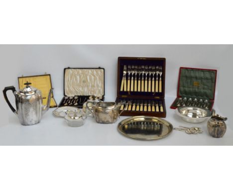 A collection of silver plated items including a three piece tea service, a circular platter, a quantity of cased flatware inc