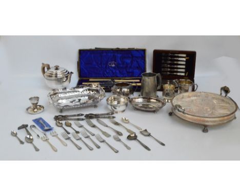 A quantity of electroplated items including a circular hors d'oeuvres dish with shaped glass liners, a three piece tea servic