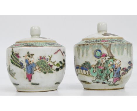 A pair of Chinese Republic period tea jars and covers, painted in enamels with continuous figural landscape and garden scene,